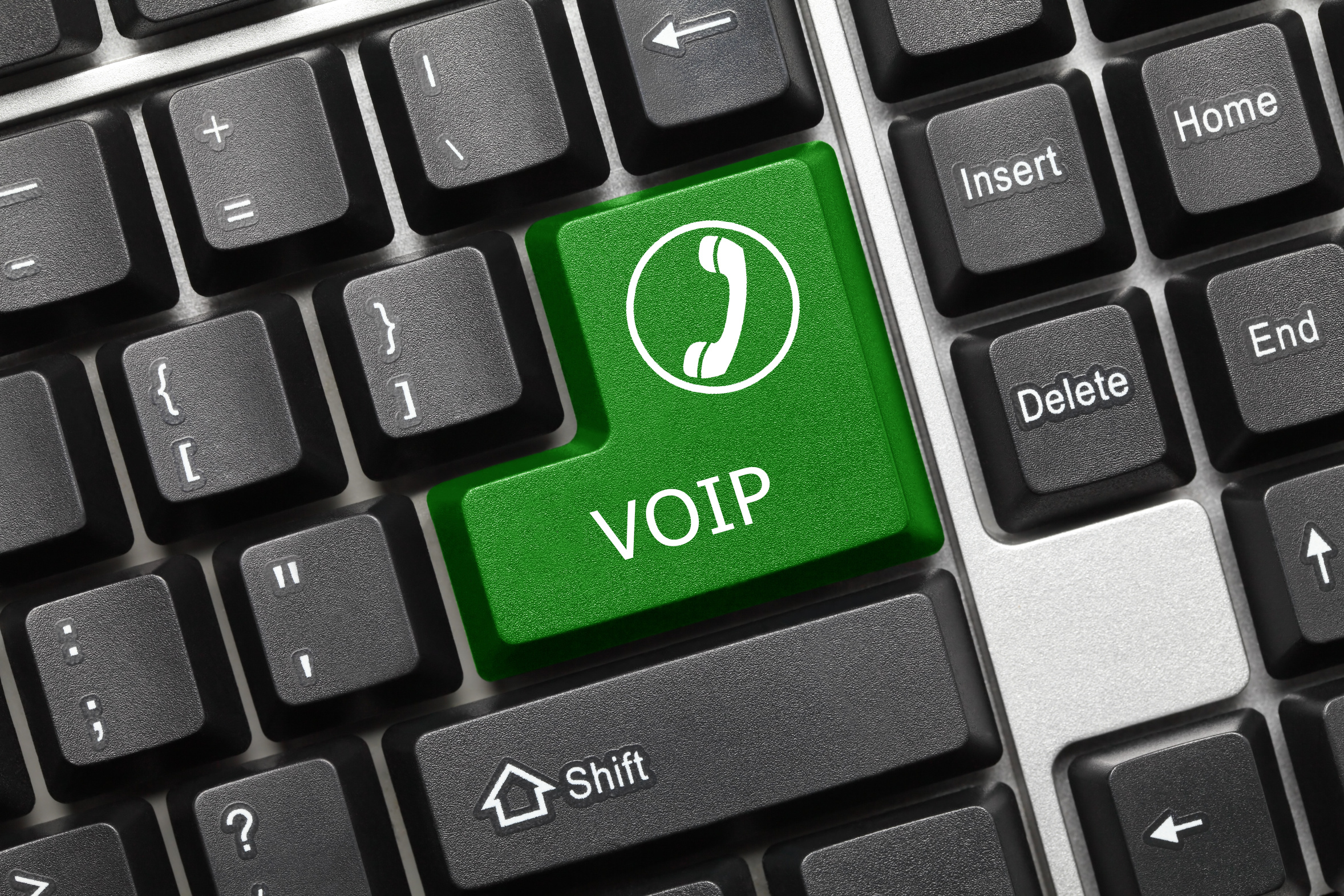 Close-up view on conceptual keyboard - VOIP (green key)